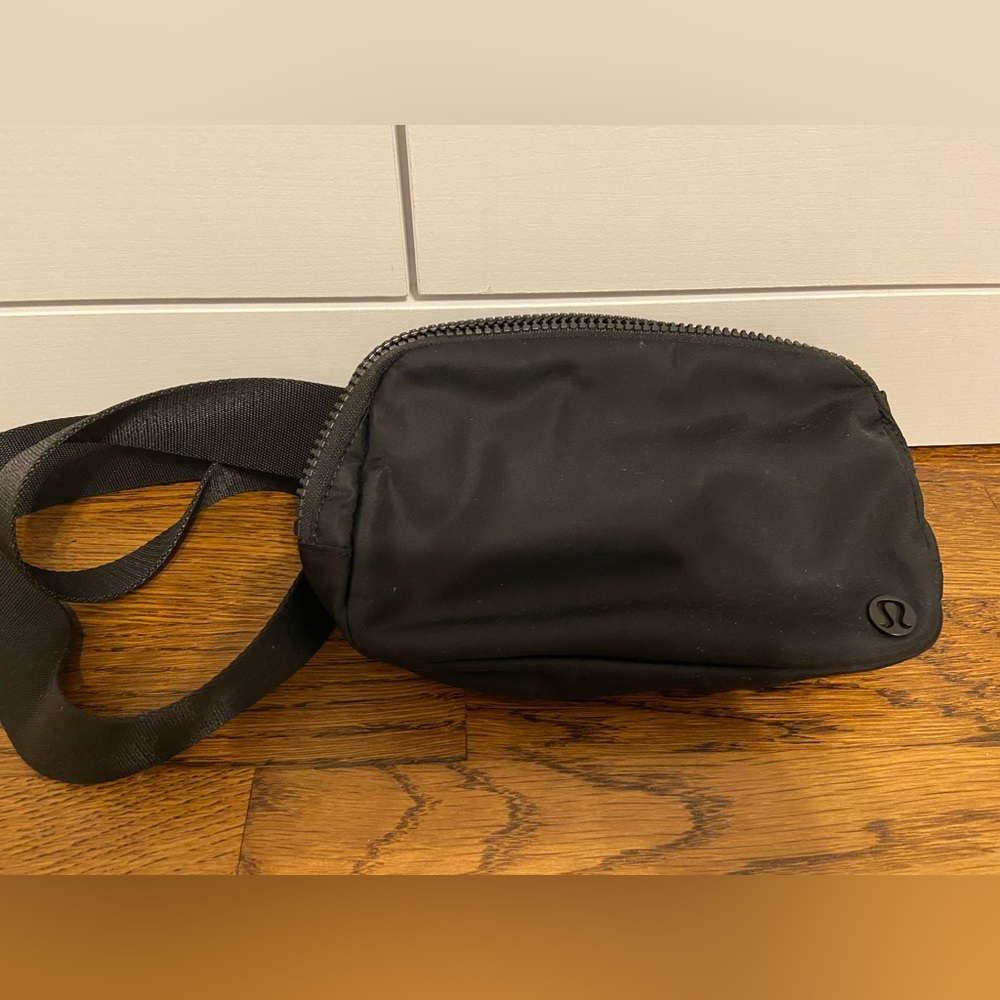 Black Lululemon everywhere belt bag with RARE tonal logo in perfect condition